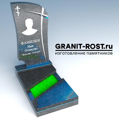Памятник из гранита и красивый цветник 